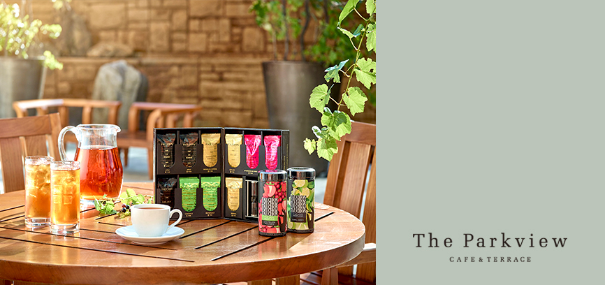 4 kinds of Fauchon tea bags on the top of the wooden table.