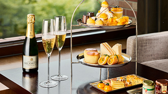 This is an image of The Library’s Summer Royal Tea. Featuring seasonal pastries and savories full of the summer flavors, refreshing desserts.