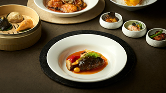 From the mid bottom to clockwise, there is a Braised Abalone, Triple Dim Sum, Sichuanese Stir-fried Shrimp Stuffed Eggplant, Seasonal Dessert and Seasonal Appetizer.