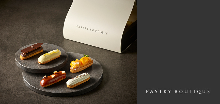 The main image features a selection of eclairs, with the Pastry Boutique of gift package set in the background.
