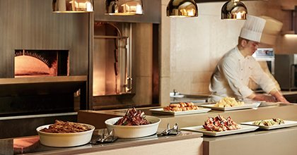 An image of a chef arranging food at The Parkview.